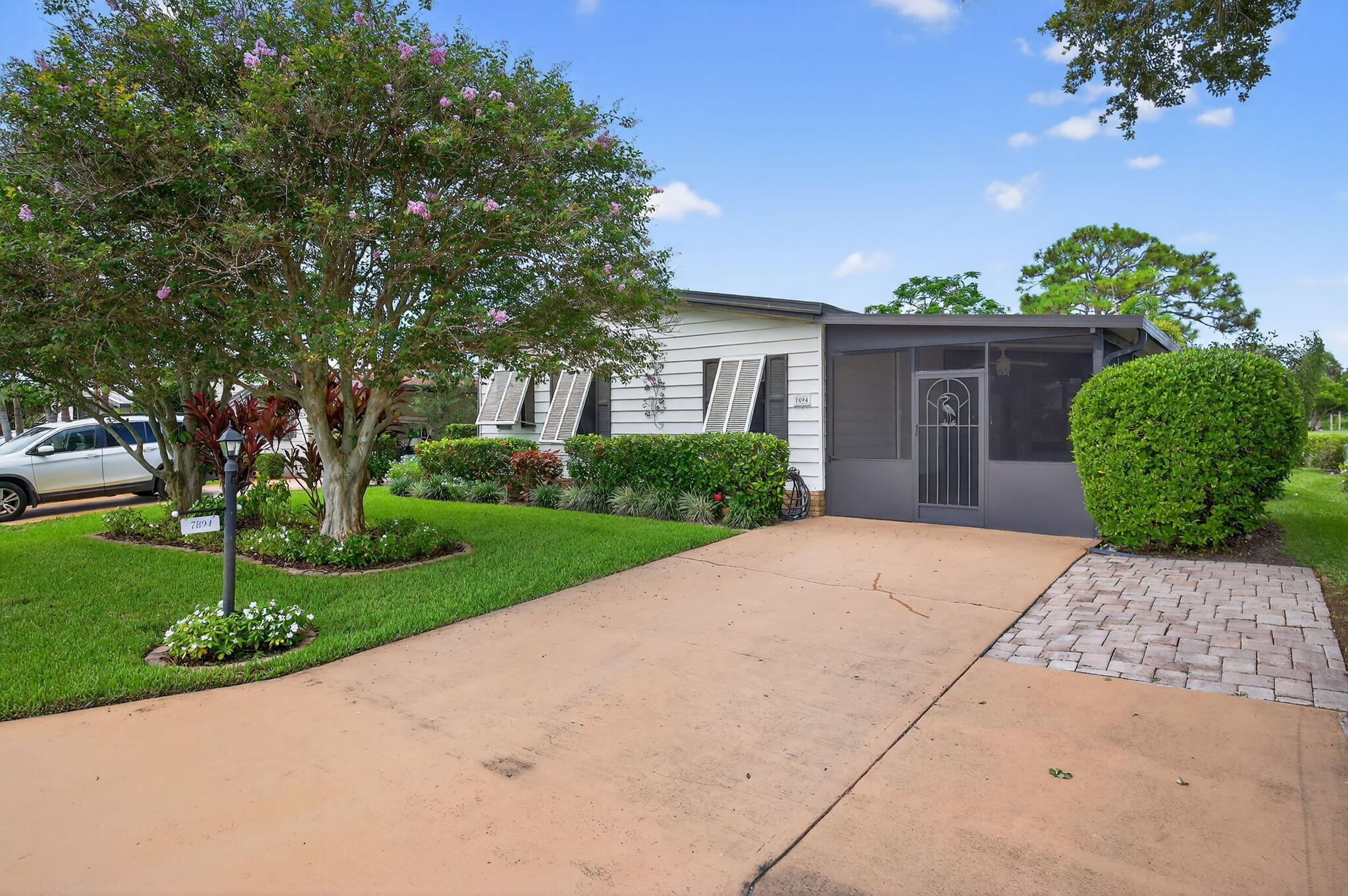 Property Photo:  7894 SE Saratoga Drive E  FL 33455 