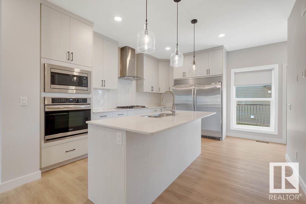 Property Photo: 4037 Hawthorn Link SW AB T6X 2Y8