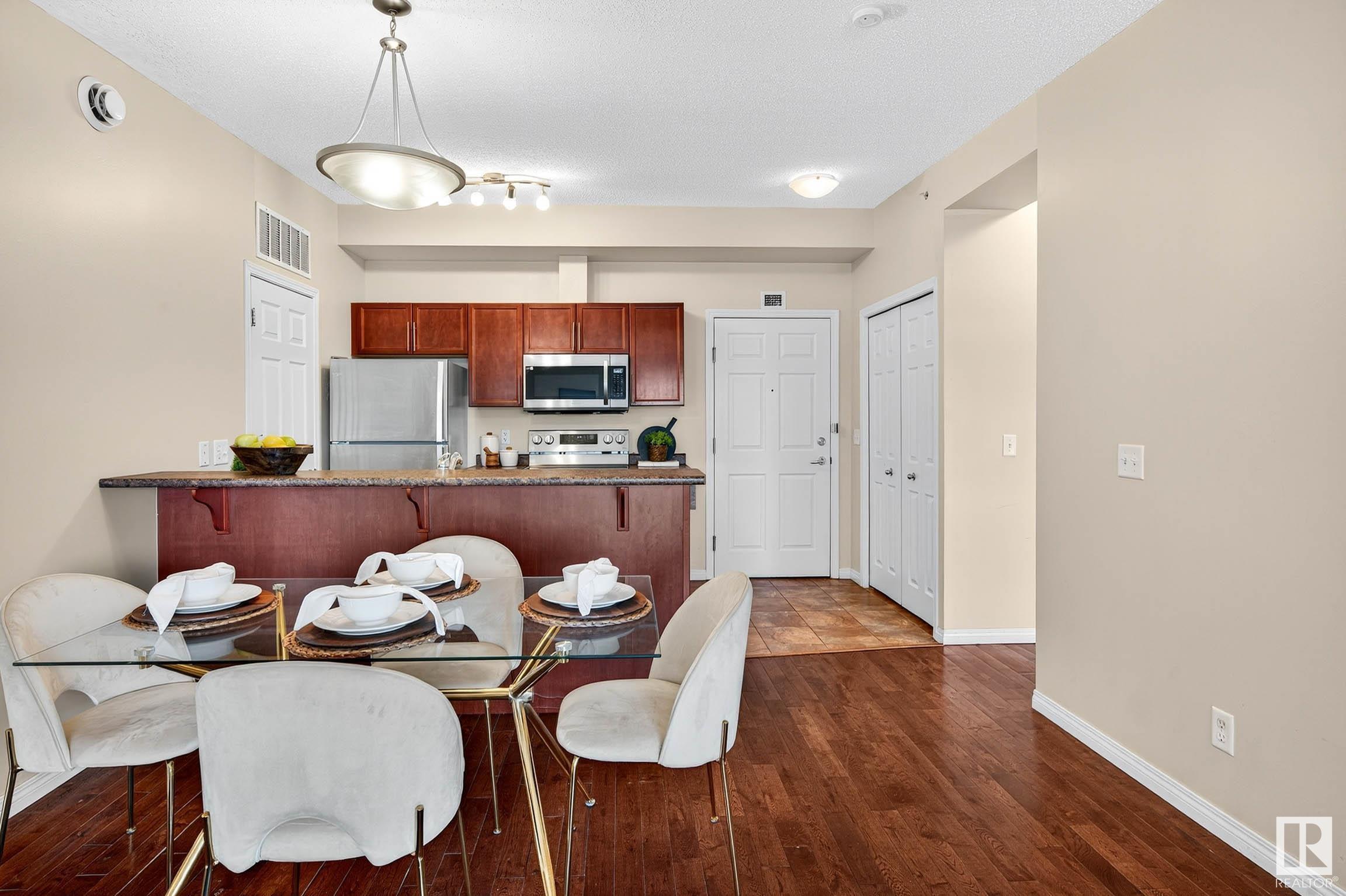 Property Photo:  6925 199 Street NW 401  AB T5T 3X8 