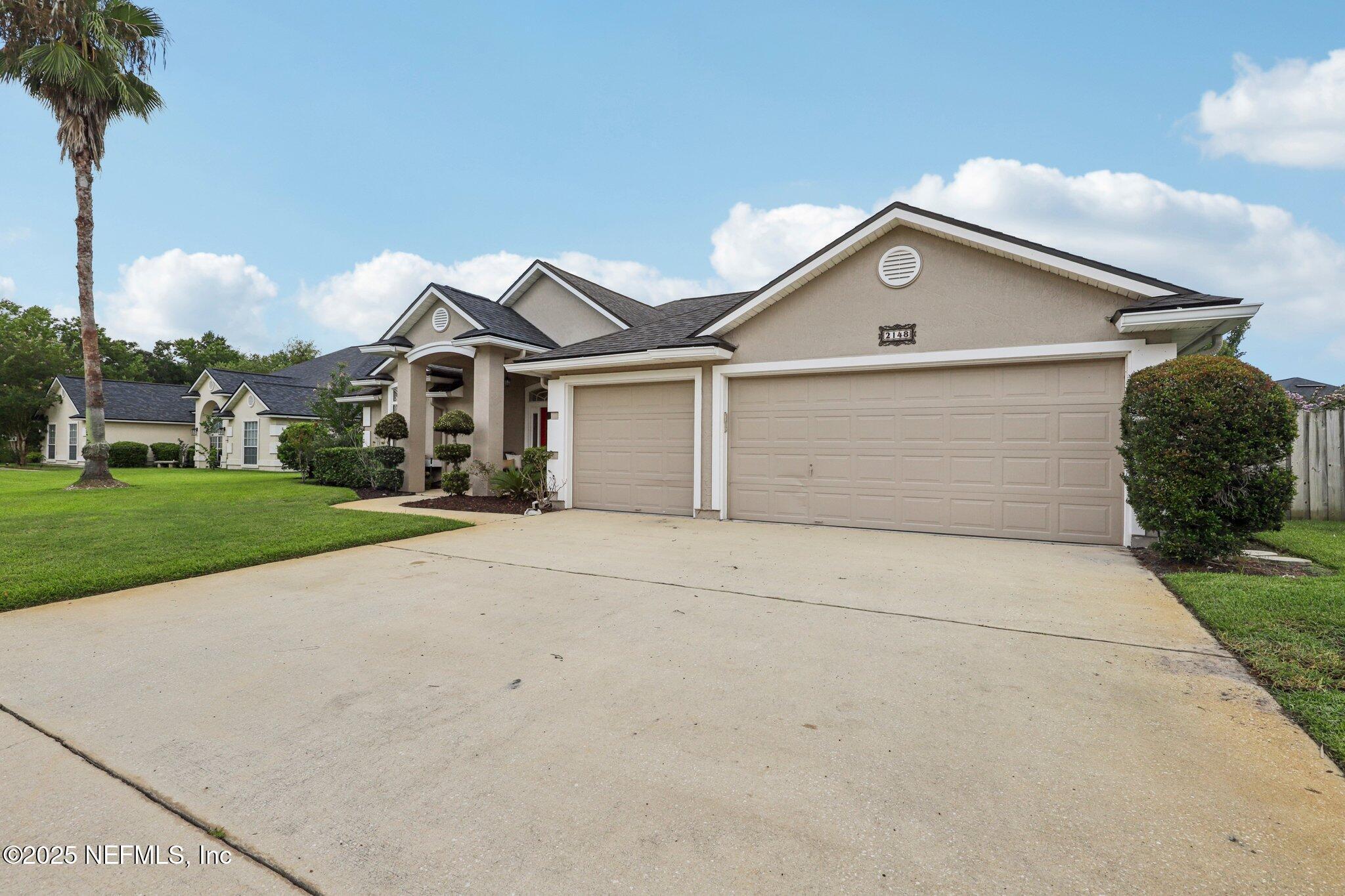 Property Photo:  2148 Blue Heron Cove Drive Drive  FL 32003 