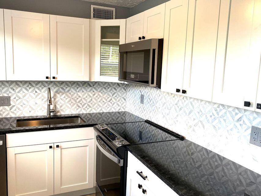 Property Photo:  260 Dorchester K  FL 33417 