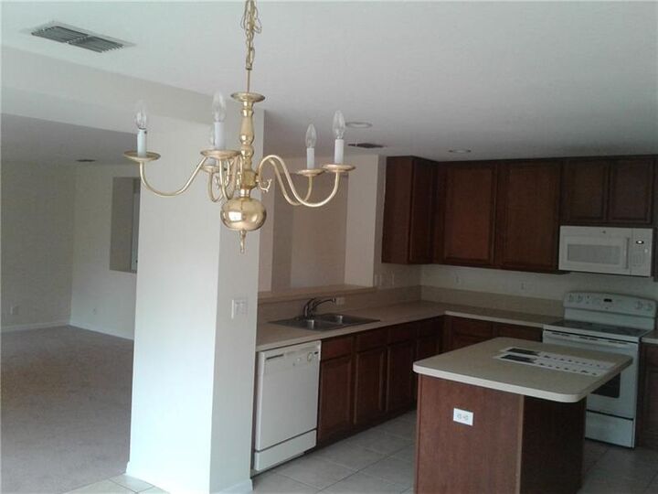 Property Photo:  1752 SW Airoso Boulevard  FL 34984 