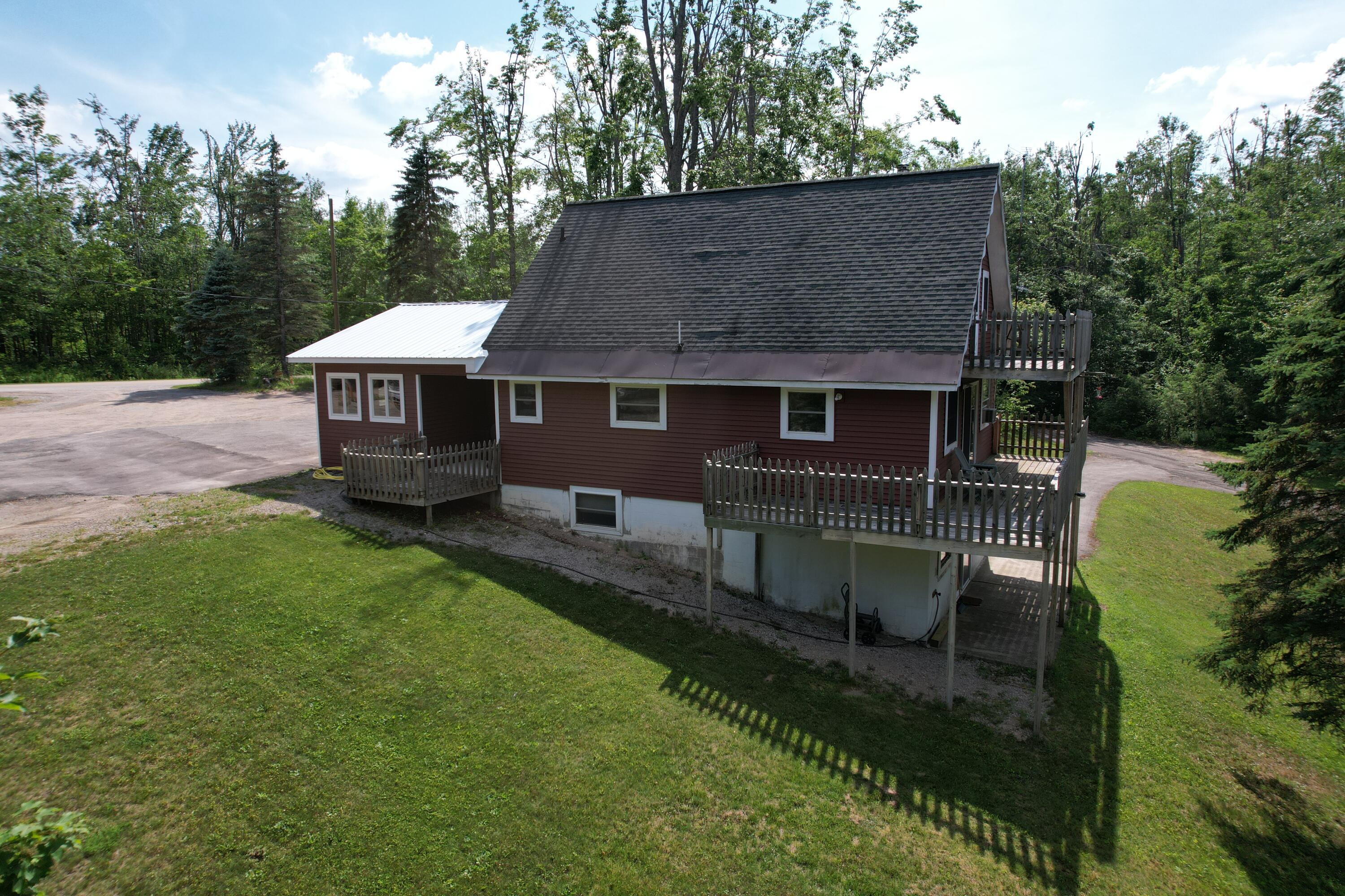 Property Photo:  6876 Old Alba Road  MI 49735 