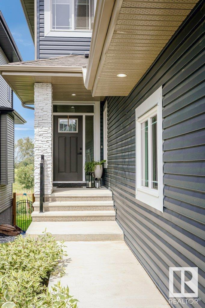 Property Photo:  20916 131 Avenue NW  AB T5S 0P4 