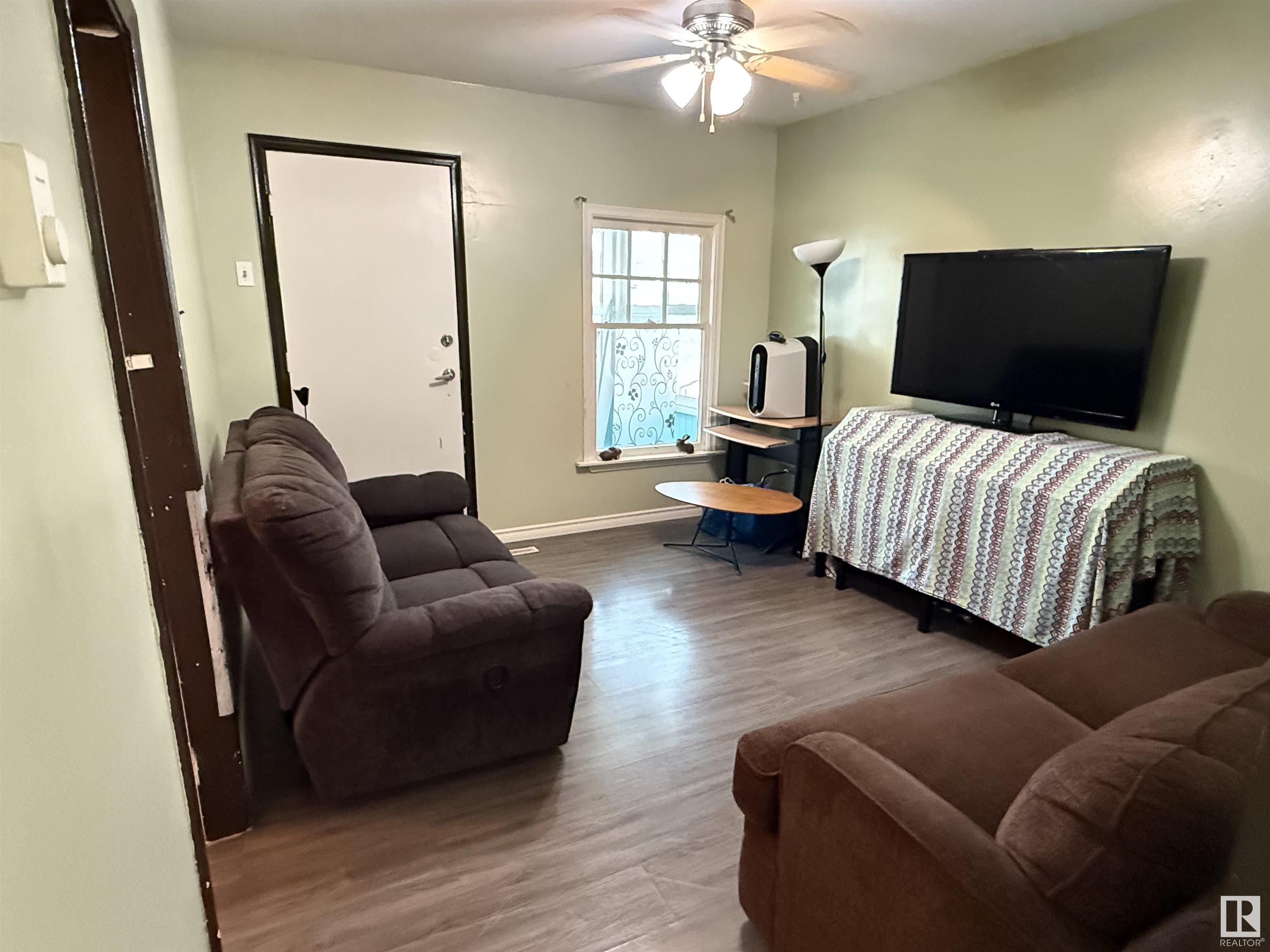 Property Photo:  12027 93 Street NW  AB T5G 1E7 