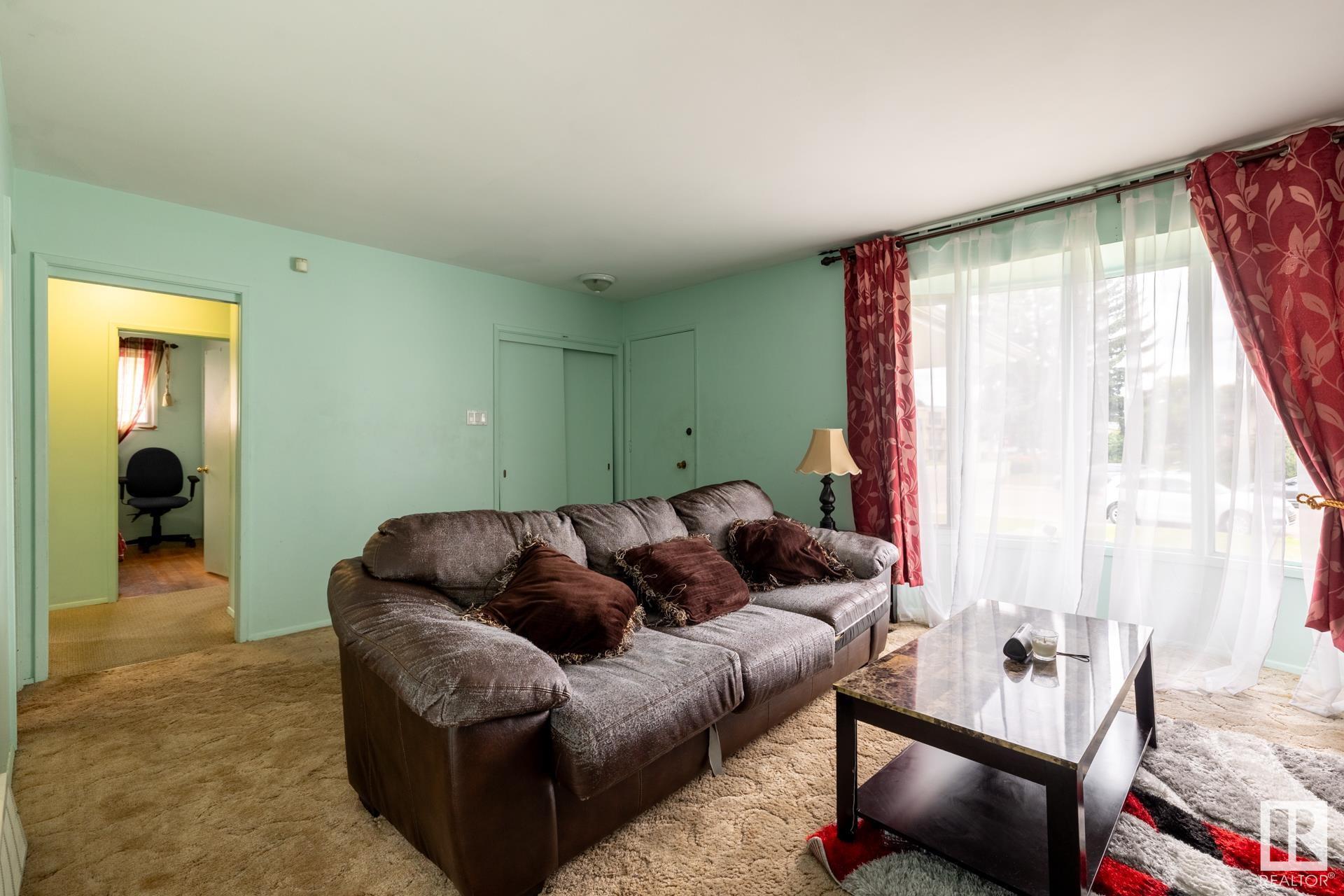 Property Photo: 13303 58 Street NW AB T5A 0P9