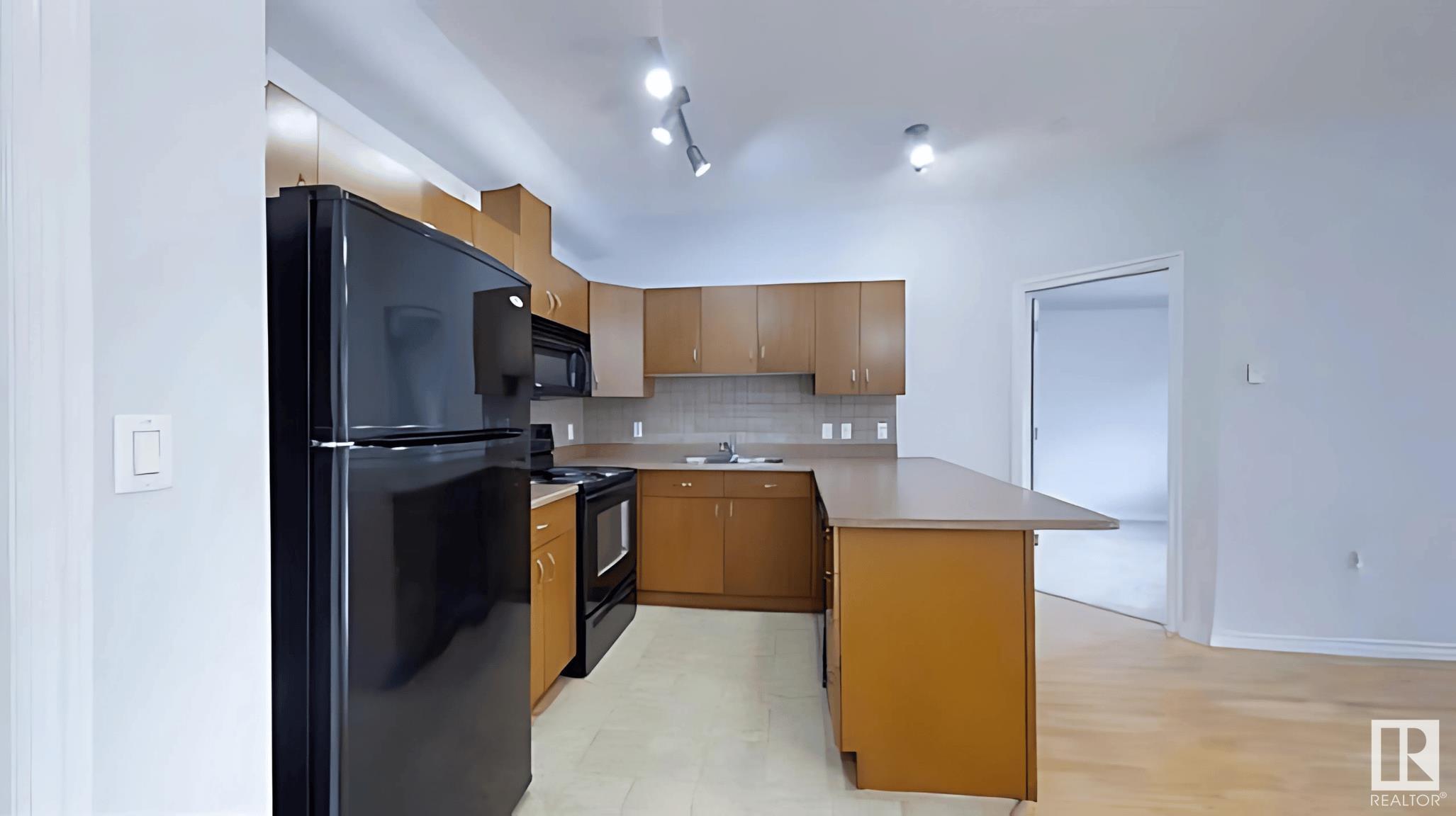 Property Photo:  10235 112 Street NW 212  AB T5K 1M7 