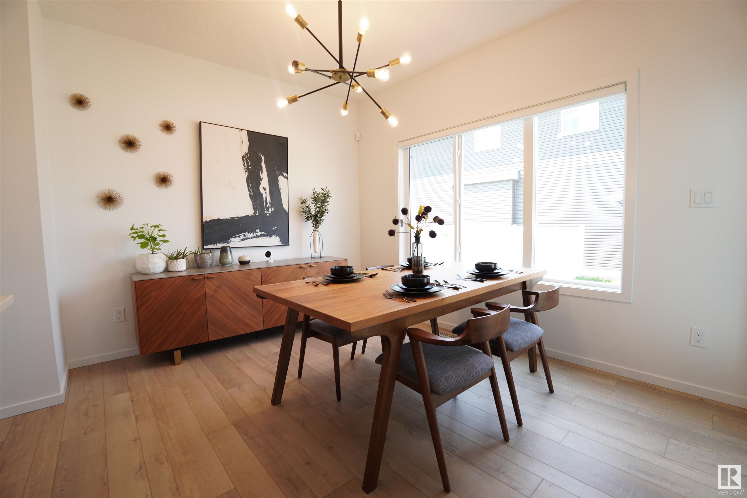 Property Photo:  5557 Schonsee Drive NW  AB T5Z 0R8 
