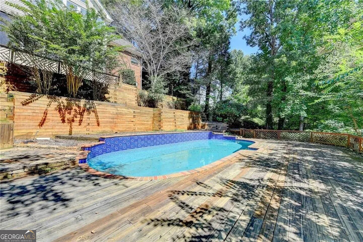 Property Photo:  4070 Runnymede Drive SW  GA 30047 