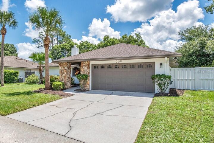 Property Photo: 209 Twelve League Circle FL 32707
