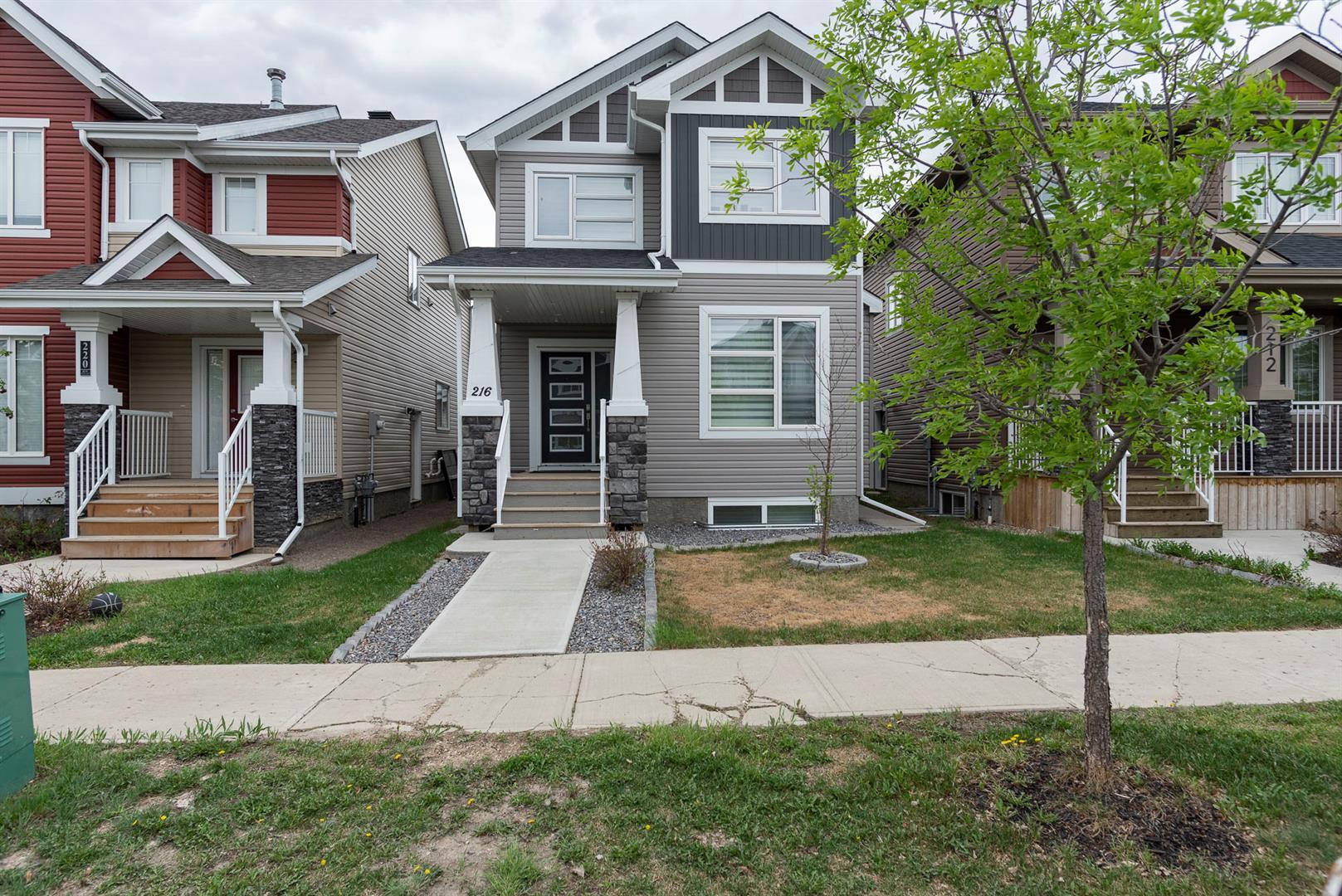 Property Photo: 216 Comeau Crescent AB T9K 2X6