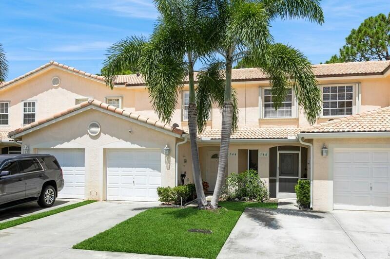 Property Photo: 144 Fox Meadow Run FL 33458