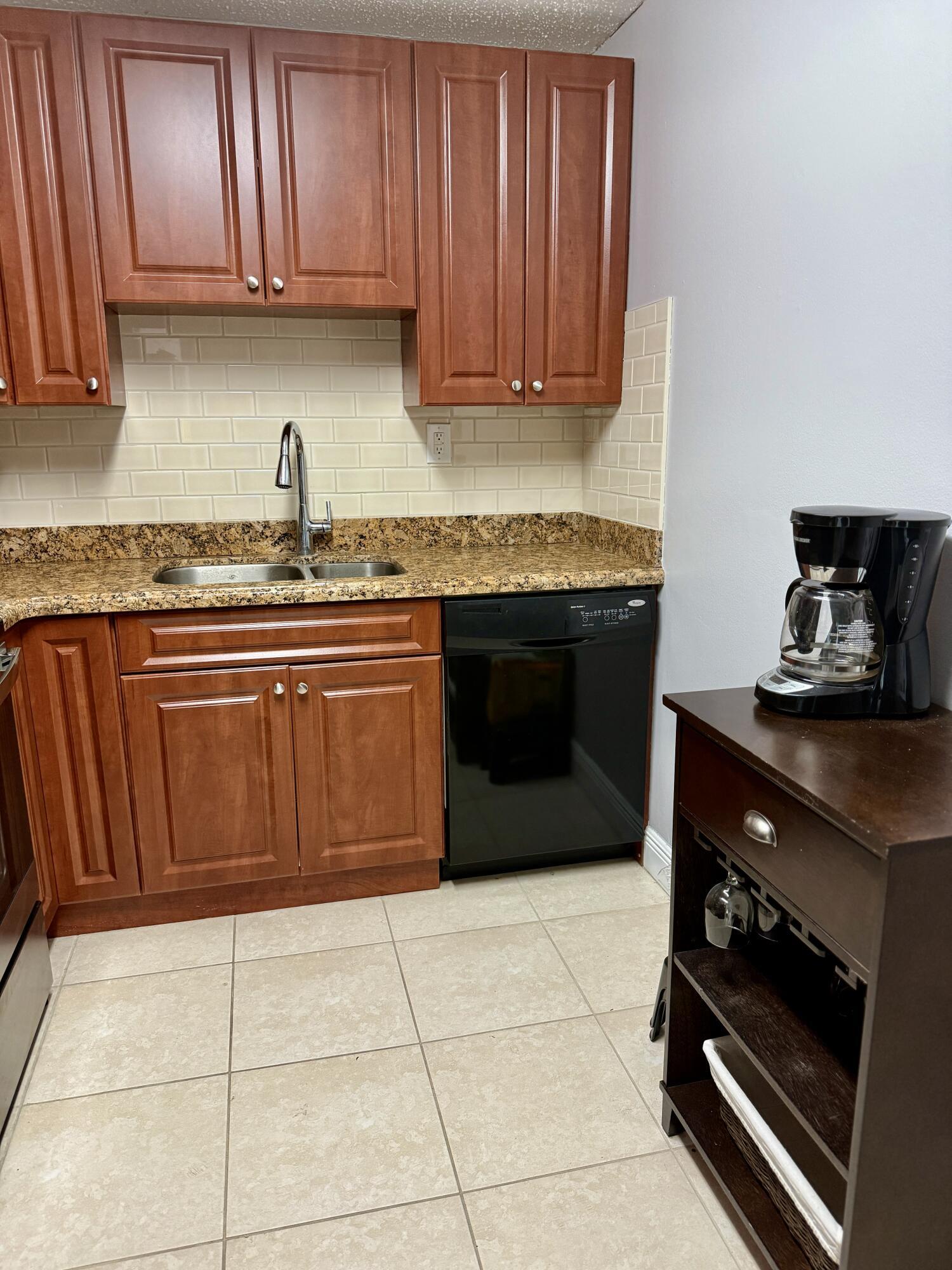 Property Photo:  405 Meadows Circle 405  FL 33436 