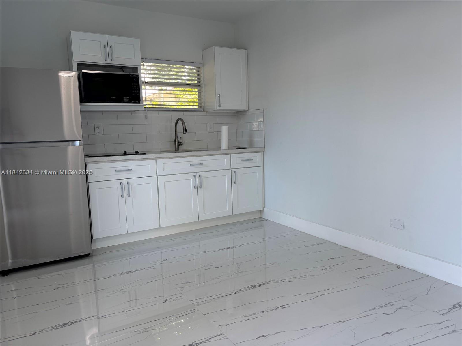 Property Photo:  214 NW 46th Ave 214  FL 33126 