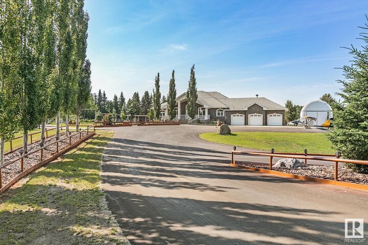 Property Photo:  51430 Rge Road 231 400  AB T8B 1K9 