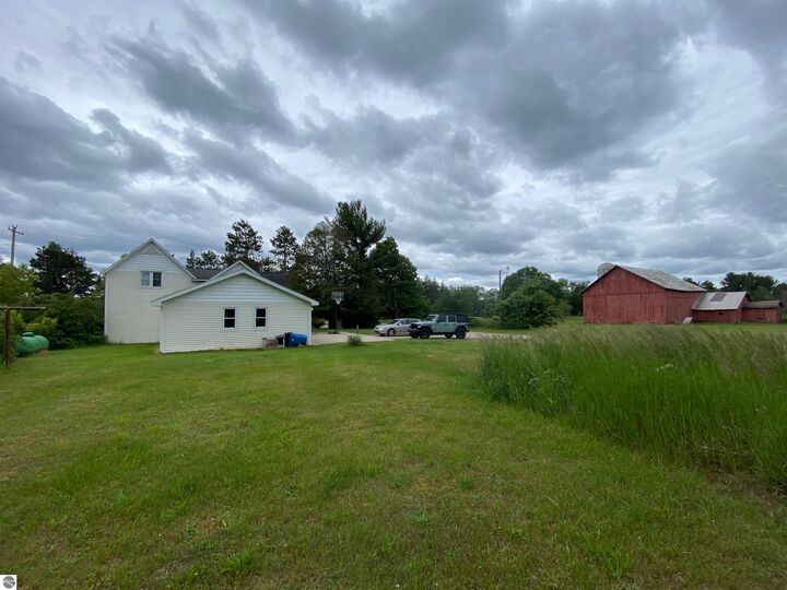 Property Photo:  20682 Honor Highway  MI 49643 
