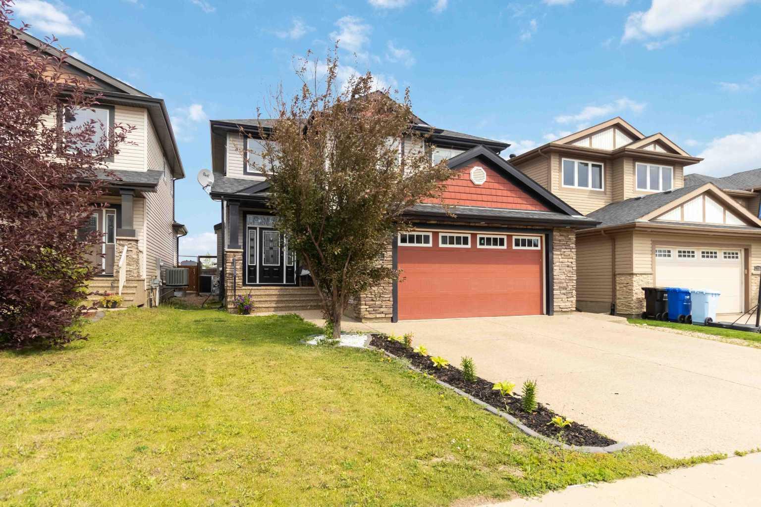 Property Photo: 200 Huberman Way AB T9K 0Z8