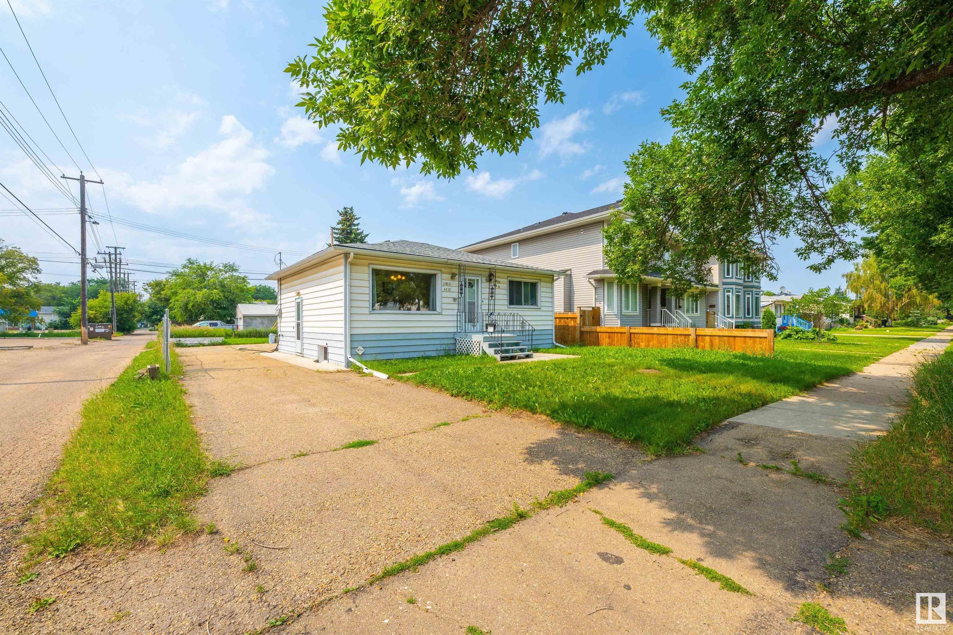 Property Photo: 11810 49 Street NW AB T5W 2Z8
