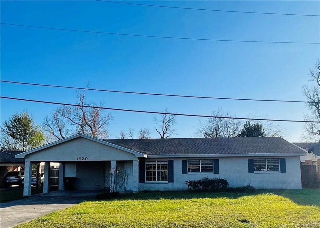 Property Photo: 1529 John Drive LA 70605