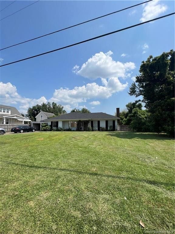 Property Photo:  819 Touchy Street  LA 70601 