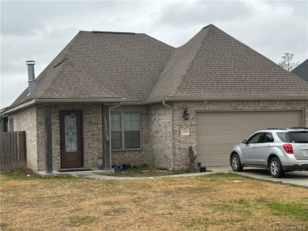 Property Photo: 1414 Trisha Court LA 70611