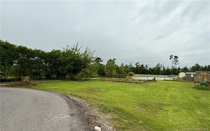 Property Photo:  7491 Pine Alley Lane  LA 70605 