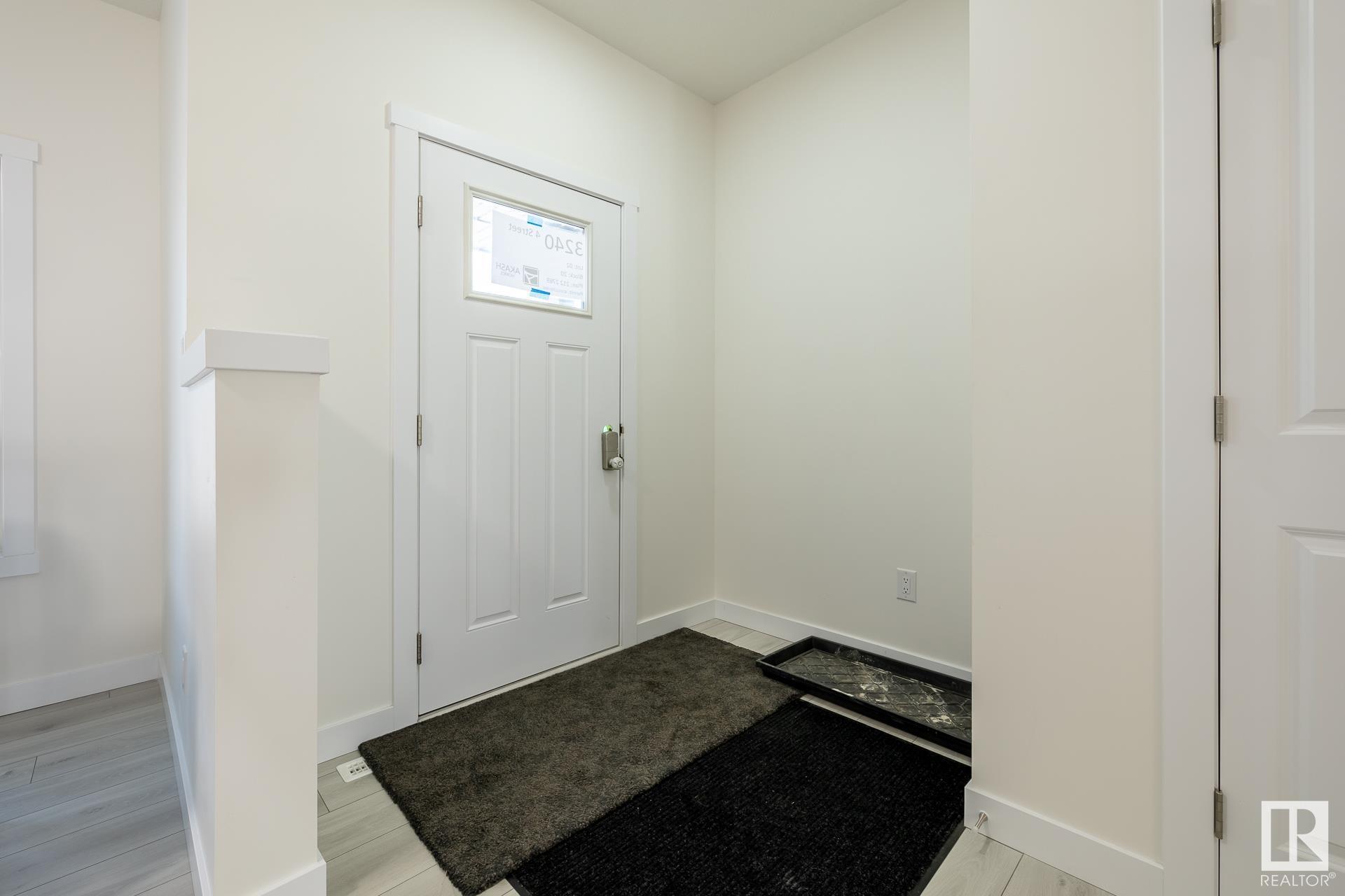 Property Photo: 122 Elliott Wynd AB T8L 1V1
