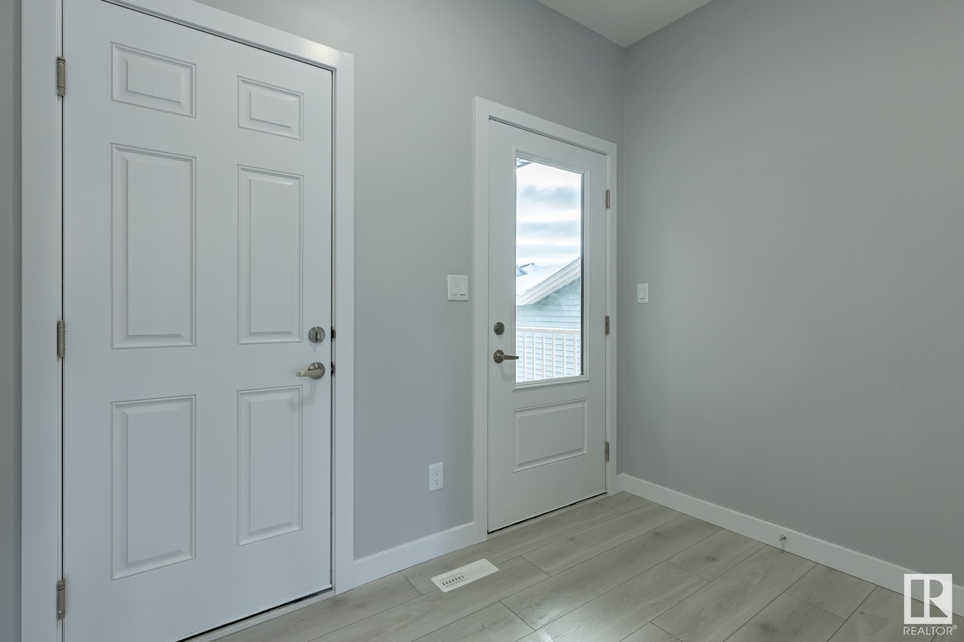Property Photo: 152 Elliott Wynd AB T8L 1V1