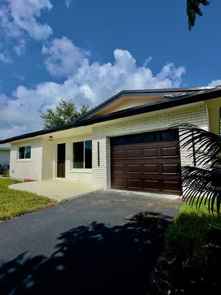 Property Photo: 6811 NW 32nd Ave FL 33309