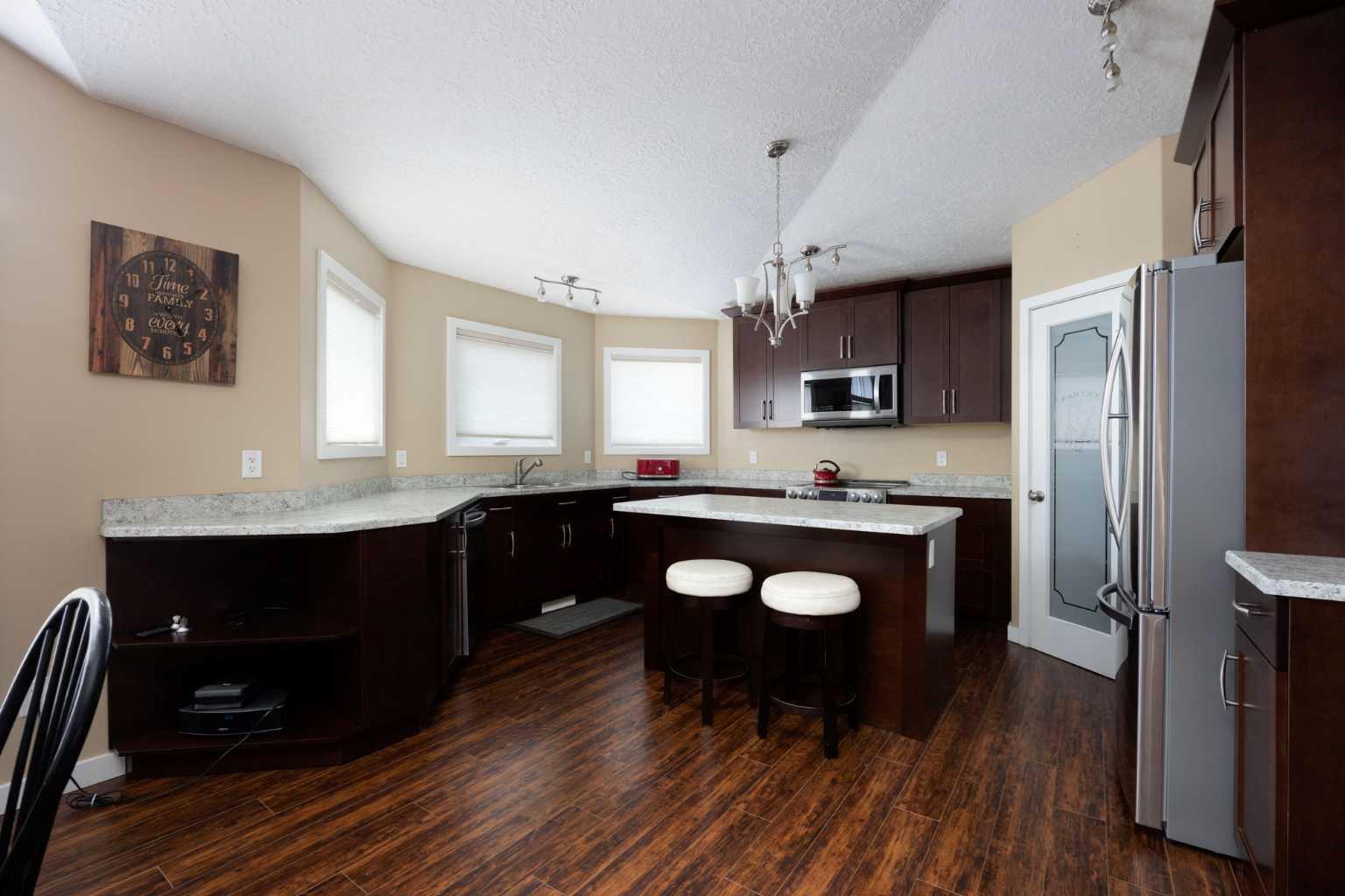Property Photo: 136 Beardsley Crescent AB T9K 2S2