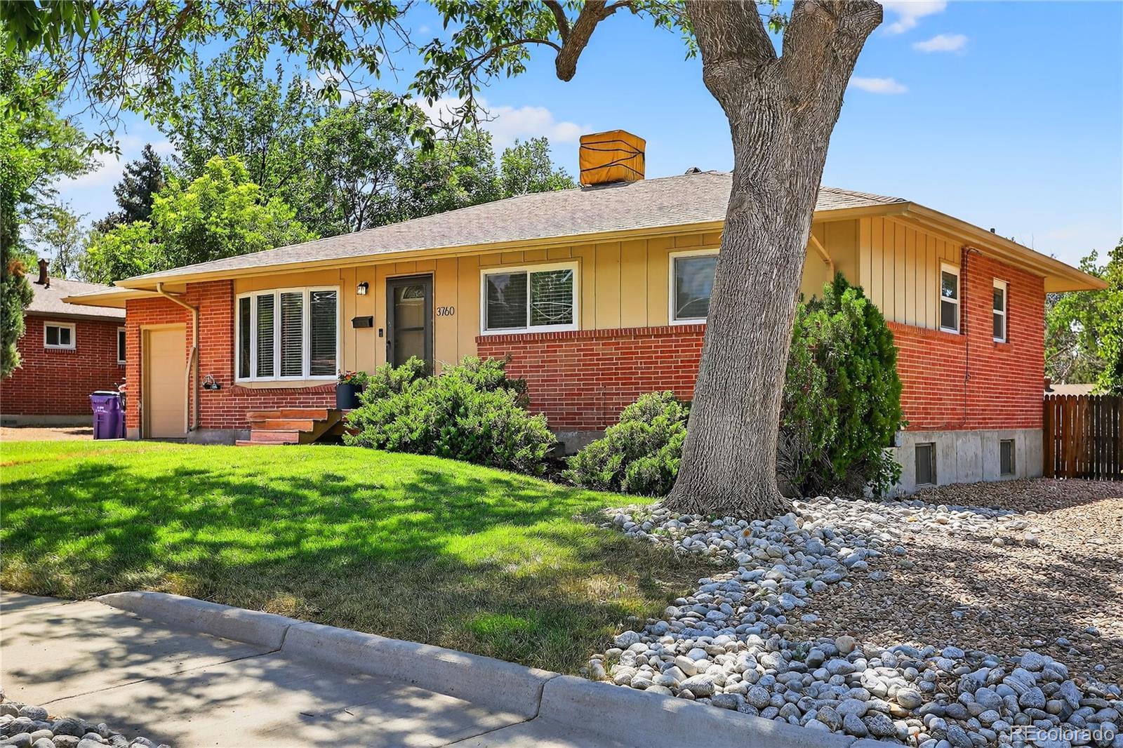 Property Photo: 3760 W Dartmouth Avenue CO 80236