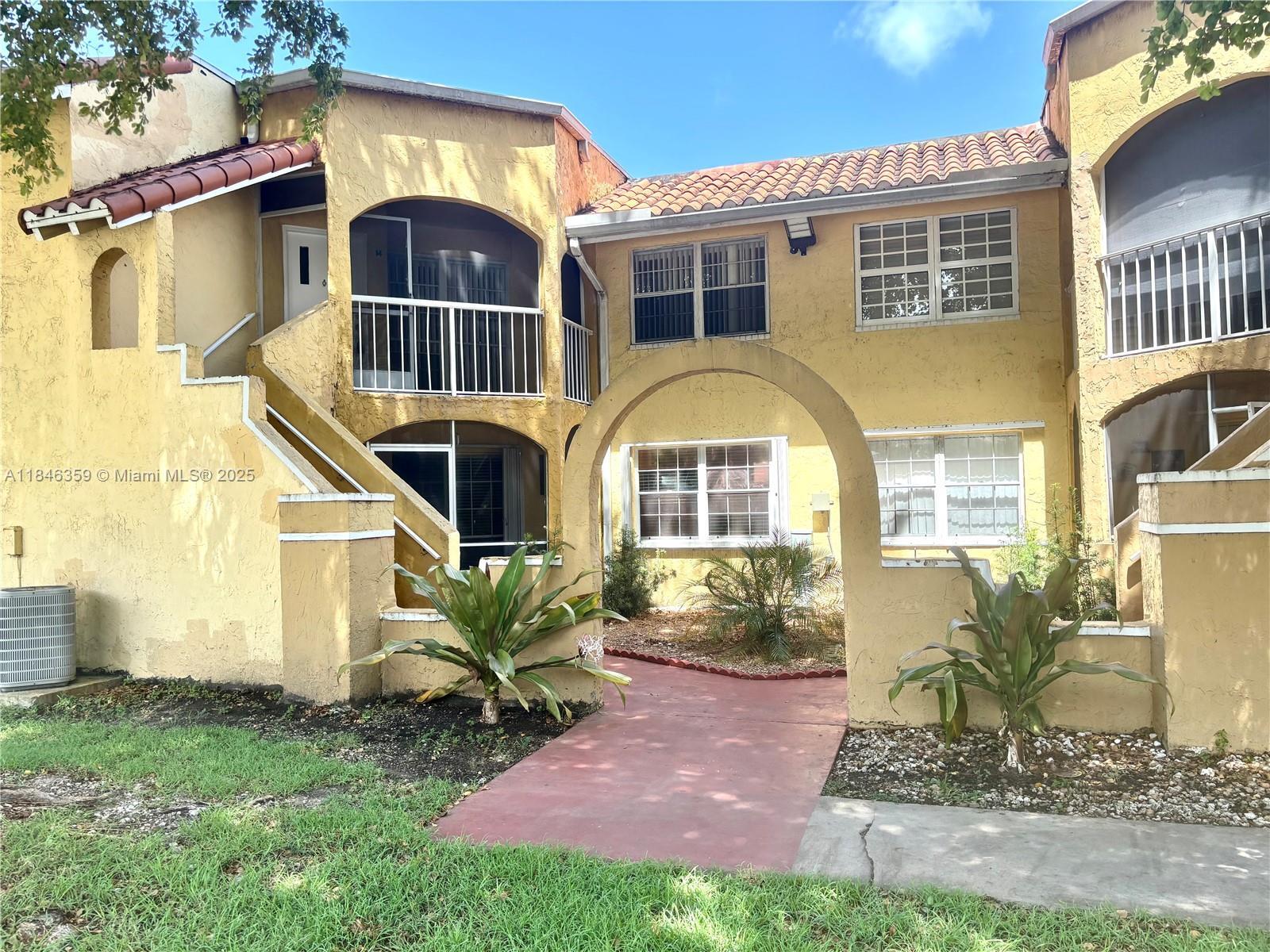 Property Photo: 15675 SW 74th Circle Dr 14 FL 33193