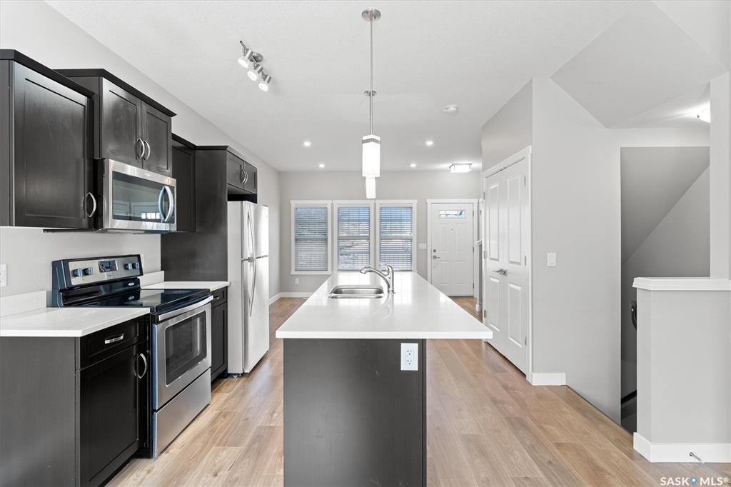 Property Photo: 1202 Pringle Way SK S7T 0X5