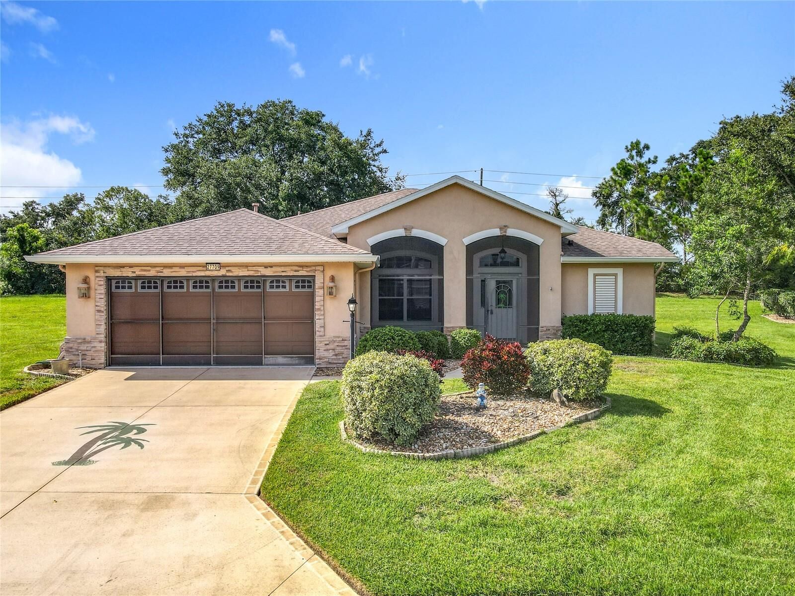 Property Photo: 27709 Snow Orchid Court FL 34748