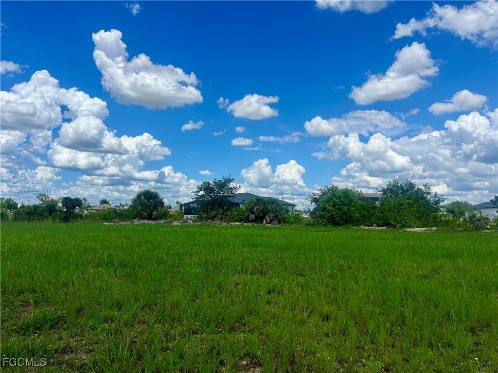 Property Photo:  203 NW 19th Place  FL 33993 