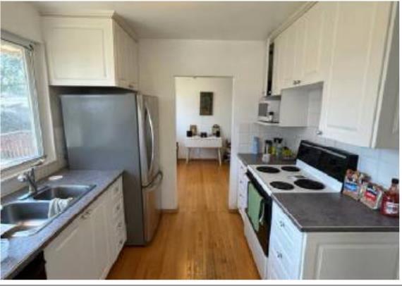 Property Photo:  4951 10 Avenue SW  AB T3C 0M3 
