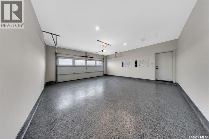 Property Photo:  4 720 Brighton Boulevard  SK S7V 1X1