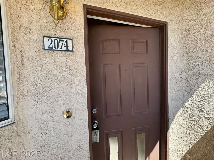Property Photo: 8501 West University Avenue 2074 NV 89147