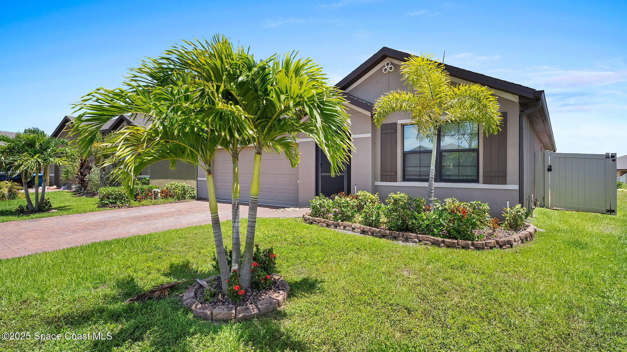 Property Photo:  1003 Remington Green Drive SE  FL 32909 