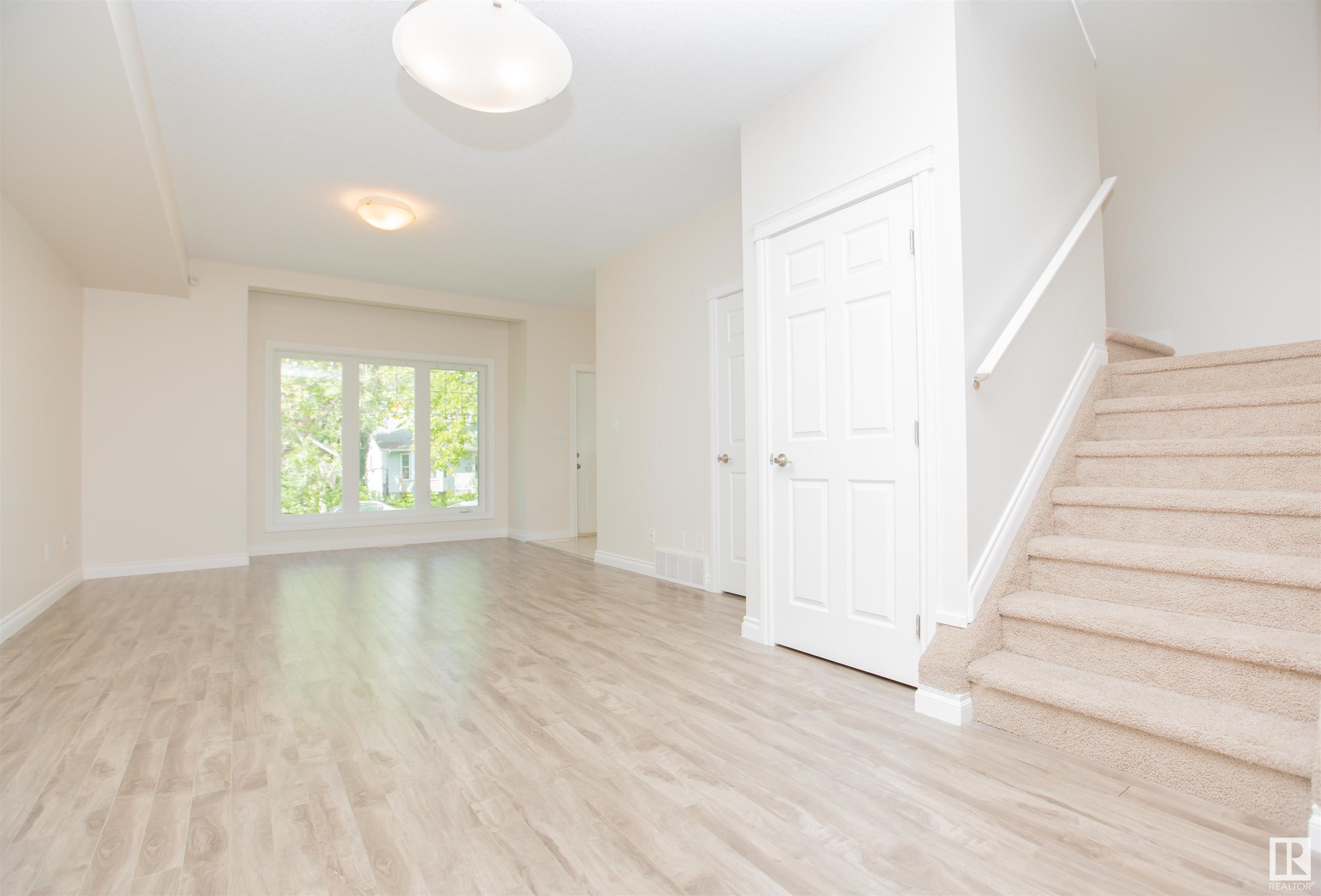 Property Photo:  11215 125 Street NW  AB T5M 0M6 