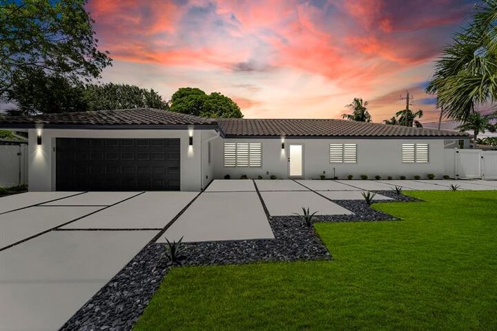Property Photo: 699 NE 70th St FL 33487