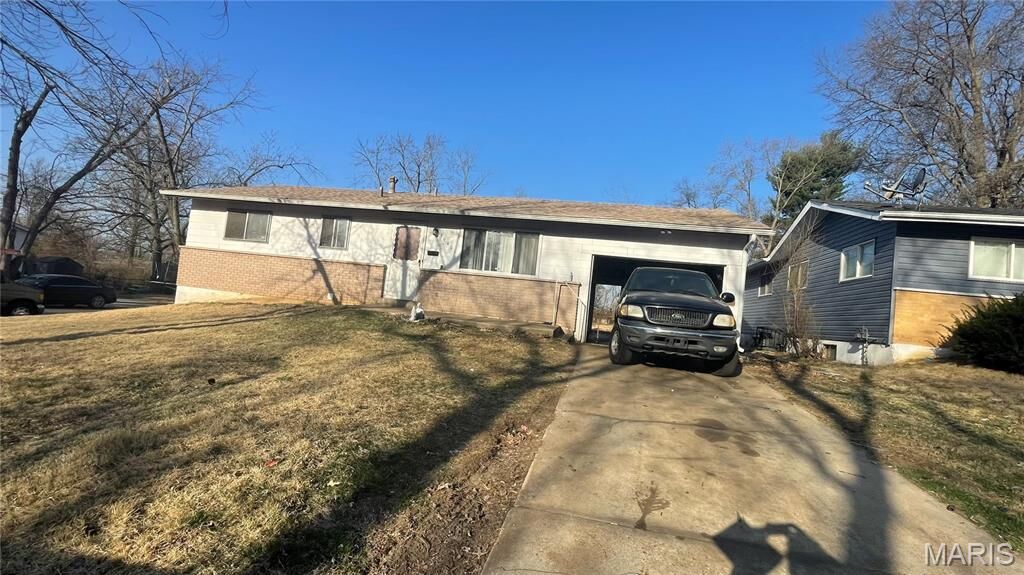 Property Photo:  10401 Baron Drive  MO 63136 