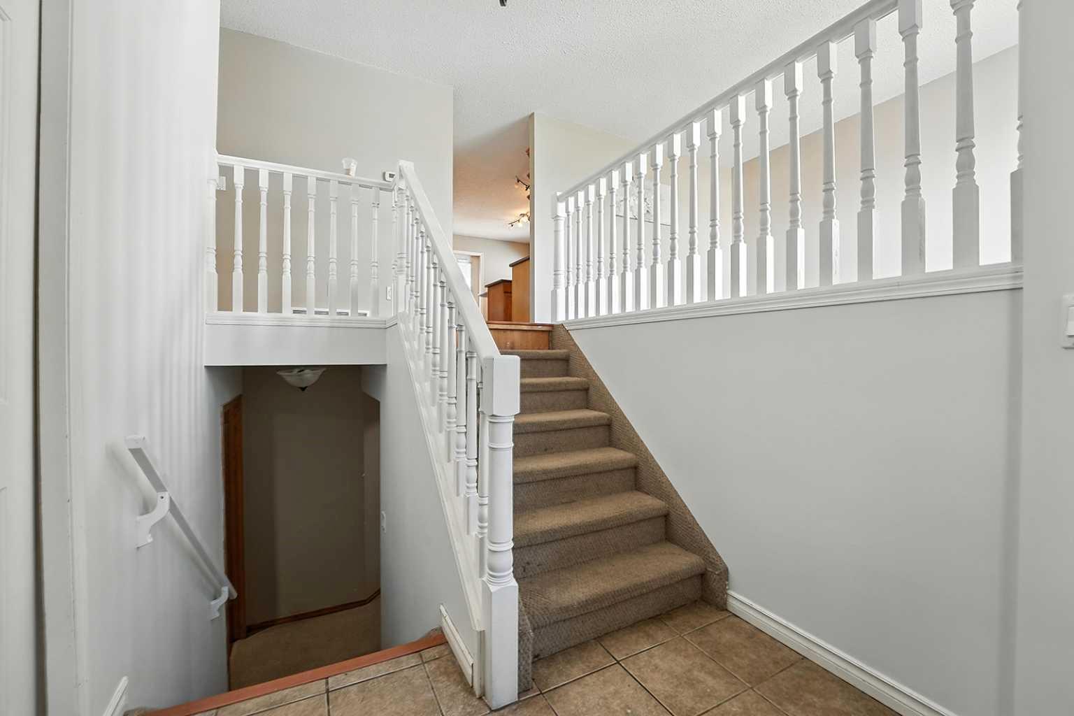 Property Photo:  55 Duston Street  AB T4R 2K4 
