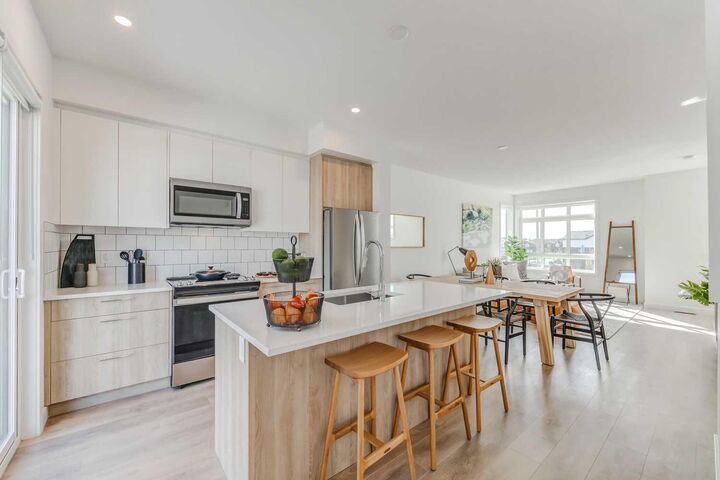 Property Photo: 857 Belmont Drive SW #305 AB T2X 4P2