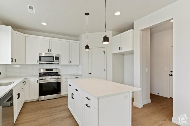 Property Photo: 293 E Vaughn Ln 15 UT 84047