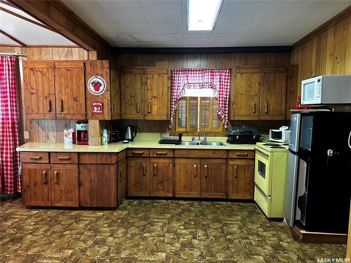 Property Photo: 8591 Hunts Cove Crescent SK S0M 0L0