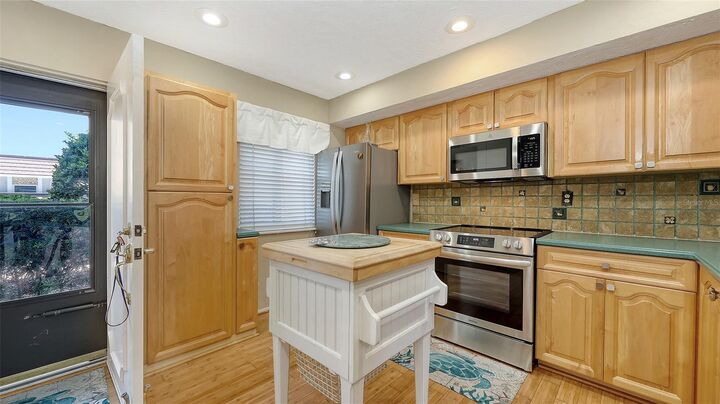 Property Photo:  8897 Midnight Pass Road 105  FL 34242 