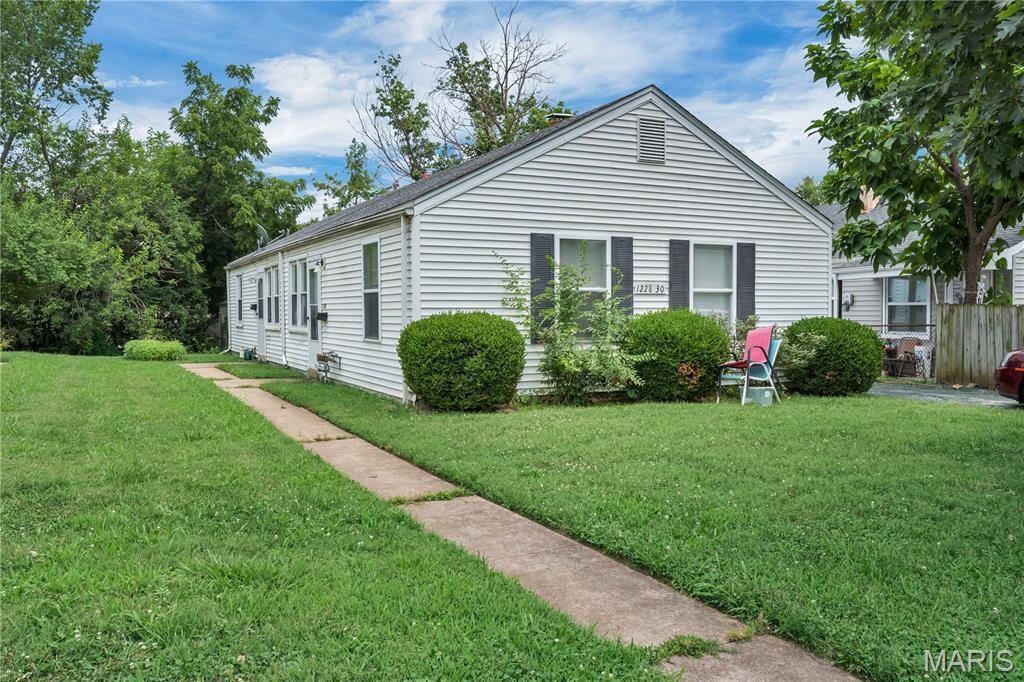Property Photo:  1228 San Jacinto  MO 63139 