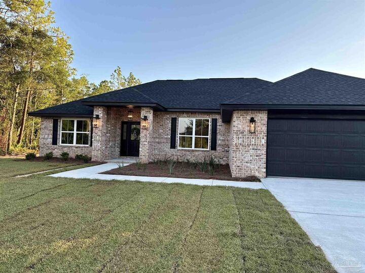 Property Photo: 7937 Twin Lake Dr FL 32583