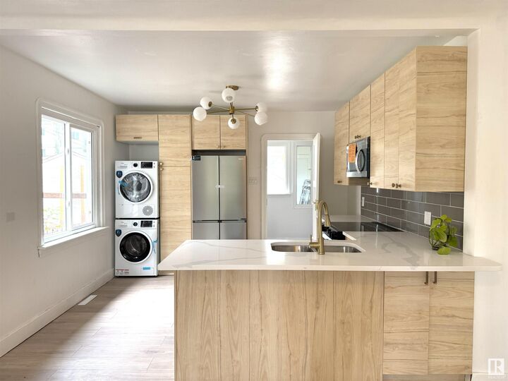 Property Photo: 11840 70 Street NW AB T5B 1T7